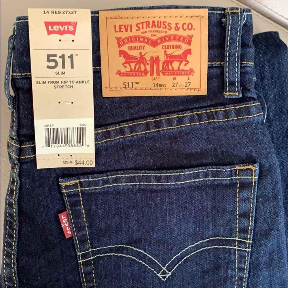 Kids Levi’s size 27X27. Dark wash. New with tags.